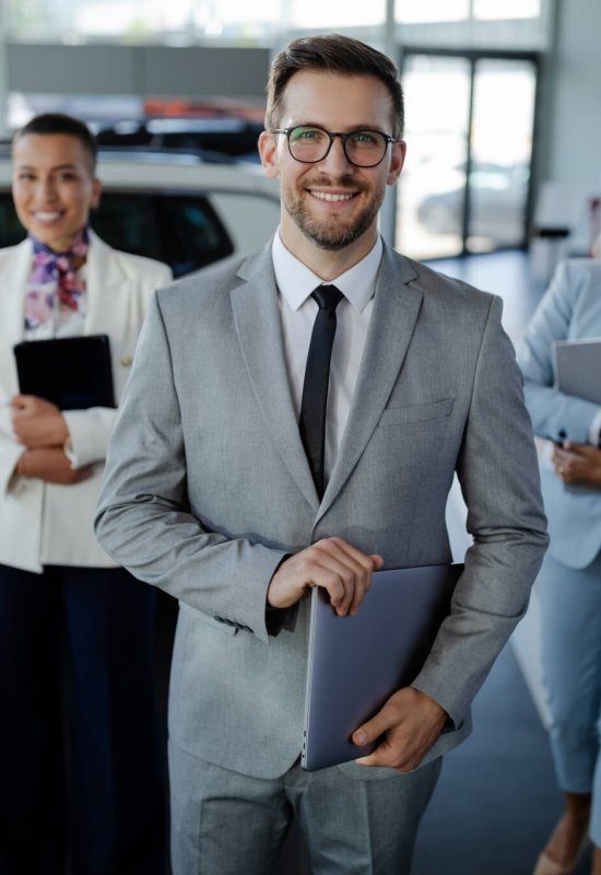 salesteam-in-dealership-three-beautiful-consultants-or-managers-in-elegant-suit-looking-on-camera--qjn5t2flx8lapi3gbxtzcvisrc75bypblk6iyqata8